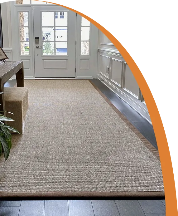 Light beige sisal carpet with woven texture.