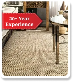 Natural sisal carpet with coarse woven texture and beige tone.