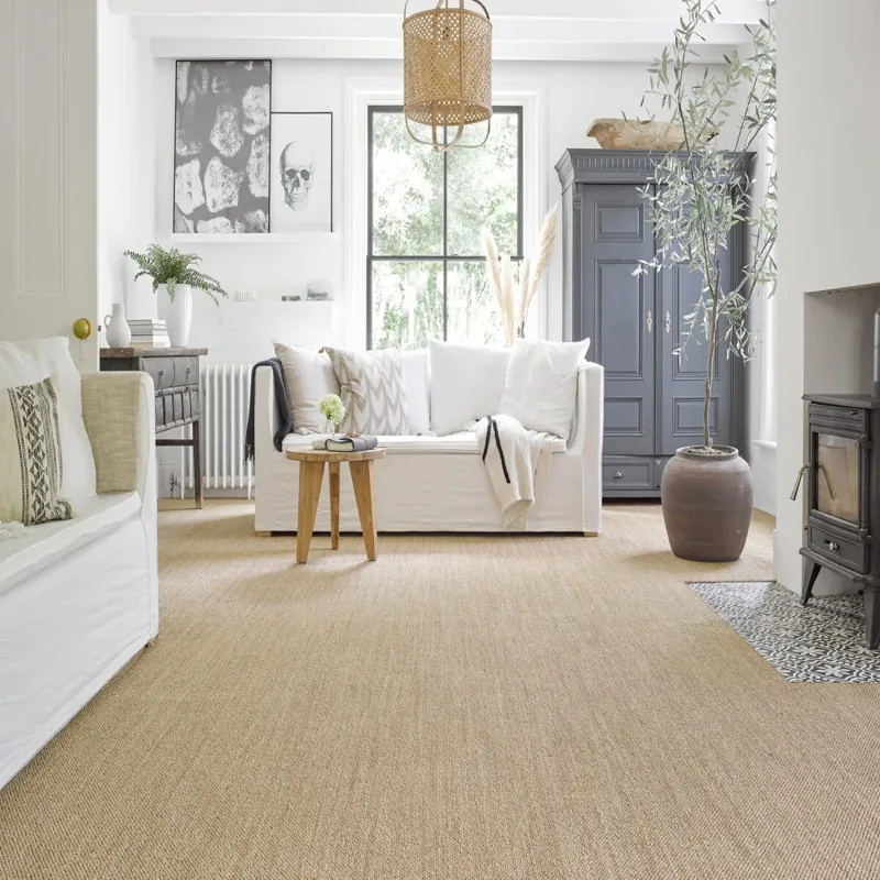 sisal carpet installed in a bright, airy living room